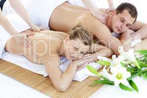 Affectionate young couple having a back massage