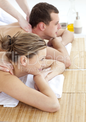 Loving couple receiving a back massage