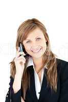 Elegant young businesswoman talking on phone smiling at the came