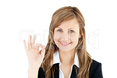 Successful businesswoman showing OK sign