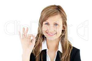 Successful businesswoman showing OK sign