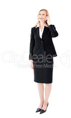 Laughing young businesswoman talking on phone