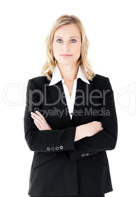 Assertive businesswoman with folded arms looking at the camera