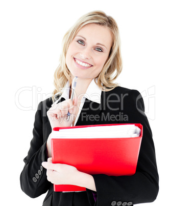 Glowing businesswoman holding a folder smiling at the camera