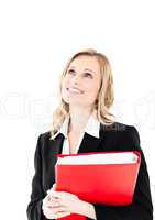 Captivating young businesswoman holding a folder