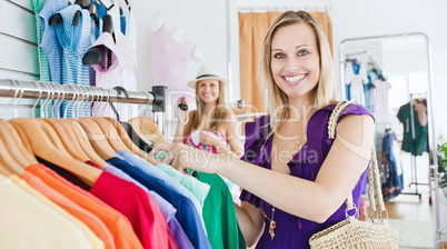 Two female friends doing shopping together