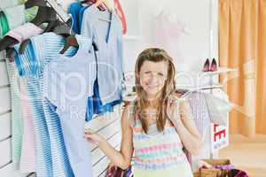 Charming caucasian woman doing shopping smiling at the camera