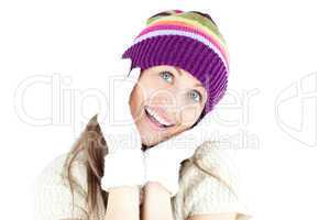 Enthusiastic young woman in the winter wearing gloves