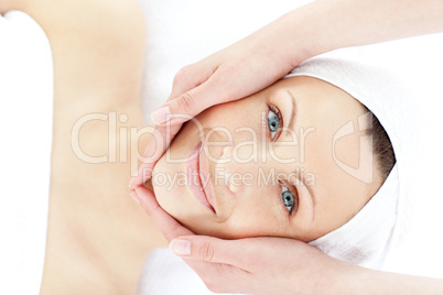 Attractive woman enjoying a head massage