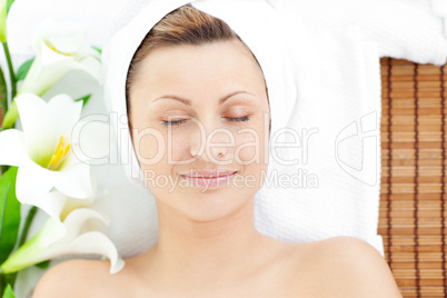 Resting woman lying on a massage table