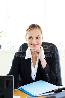 Porait of an attractive businesswoman smiling at the camera