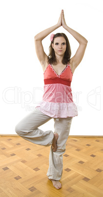 Young female practising yoga