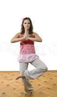 Young female practising yoga