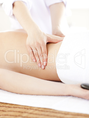 Close-up of a caucasian woman having a back massage in a spa cen