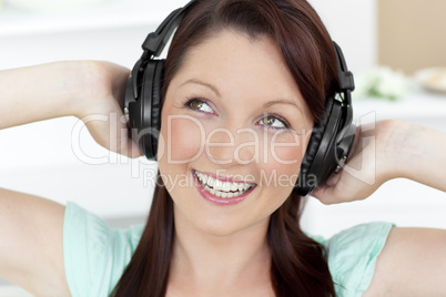 Animated young woman listen to music wearing headphones