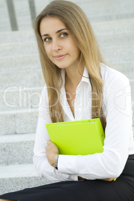 Businesswoman with a folder