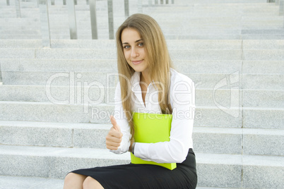 Businesswoman with a folder