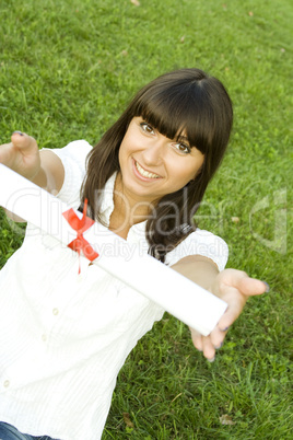 Young woman with a diploma