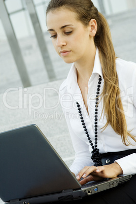 Business woman with laptop