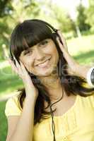 Young woman listening to music