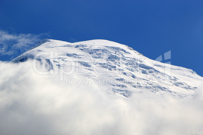 Beautiful snowy top of a mountain in the Alps