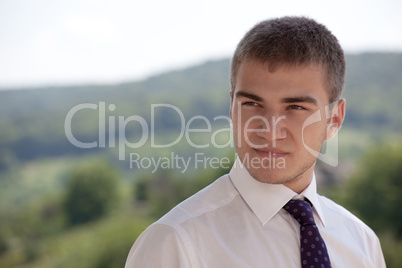 Portrait of young man looking away