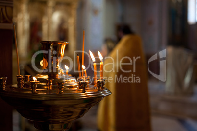 Fiery candles in a church