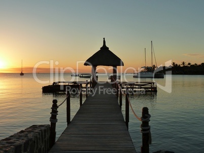 Beautiful landing stage in sunset on Mauritius