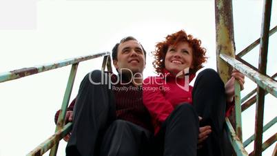 Couple sitting on the stairs