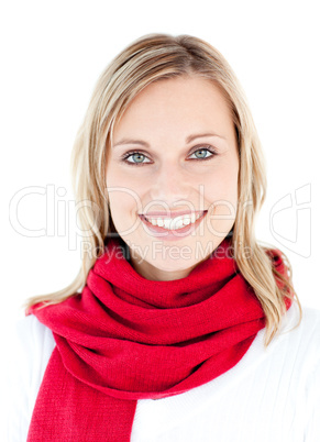 Portrait of a beautful woman with a red scarf smiling at the cam