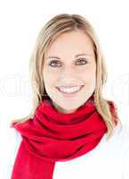 Portrait of a beautful woman with a red scarf smiling at the cam
