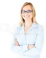 Confident businesswoman with folded arms smiling at the camera