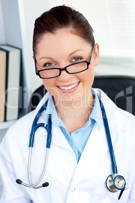 Sophisticated female doctor smiling at the camera