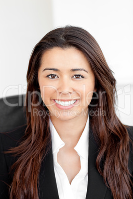 Portrait of a smiling asian businesswoman looking at the camera