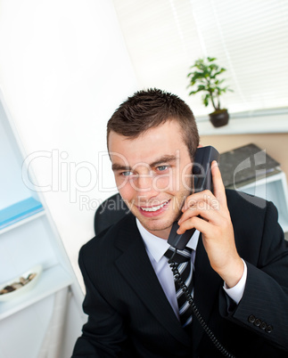 Sophisticated young businessman talking on phone