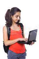 teenage student working on laptop