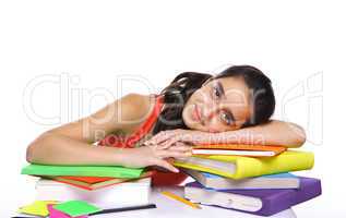young girl leaning on her books