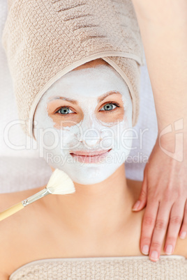 Captivating woman receiving a beauty treatment