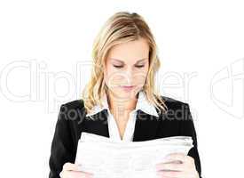 Anxious businesswoman holding a newspaper