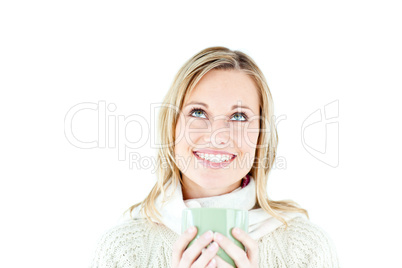 Smiling woman enjoying a hot coffee