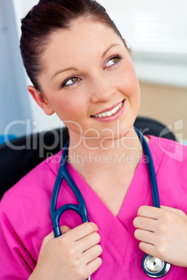 Pensive female surgeon with a stethoscope