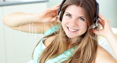 Smiling young woman listen to music