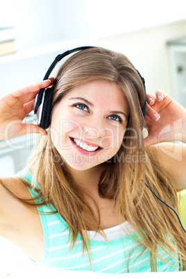 Lively young woman listen to music