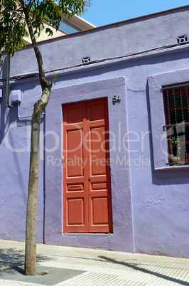 Red door and violet wall