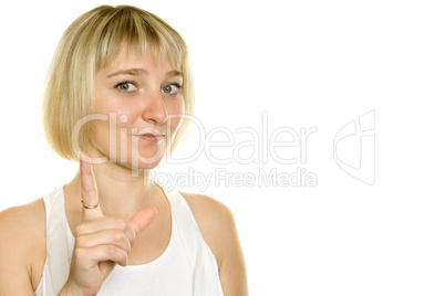 Young girl pointed a finger in the frame