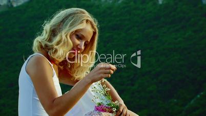 Girl with wild flowers
