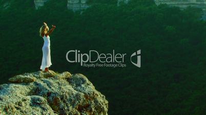 Girl among mountain nature