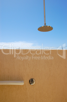 Outdoor shower at modern luxury hotel, Crete, Greece