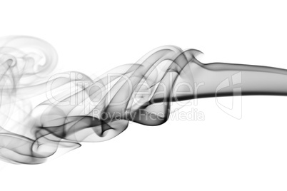 Abstraction. puff of black fume on white