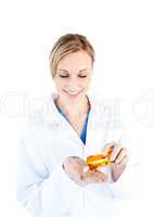 Close-up of a caucasian doctor holding pills